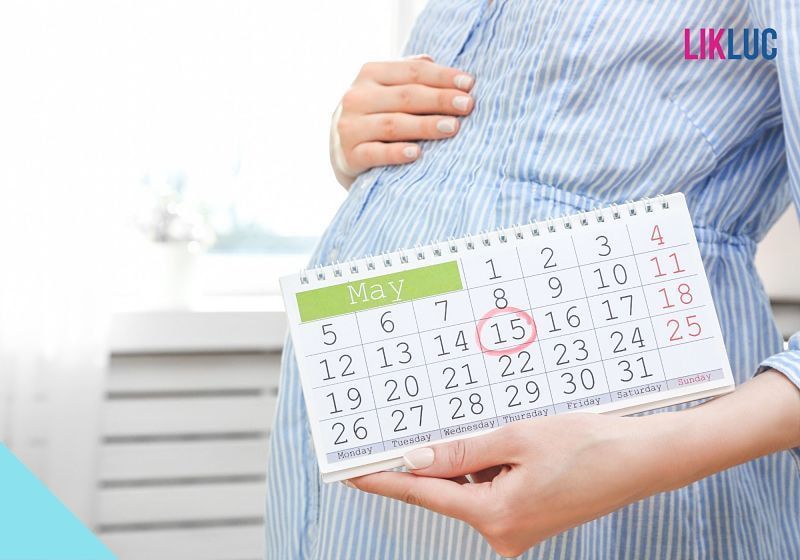 gestante segurando calend%C3%A1rio de maio opt gestante segurando calendário de maio